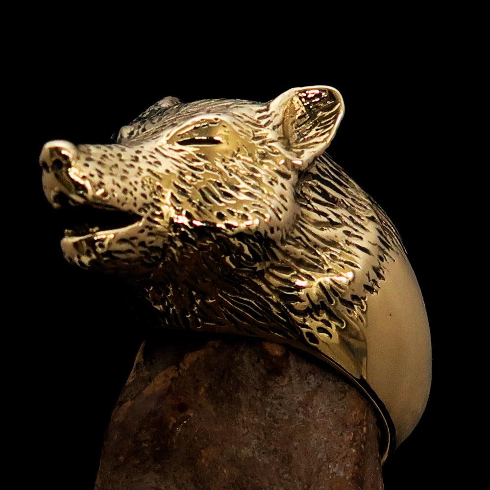 Men's Howling Wolf Pinky Ring in antiqued brass with intricate detailing and a vintage finish.