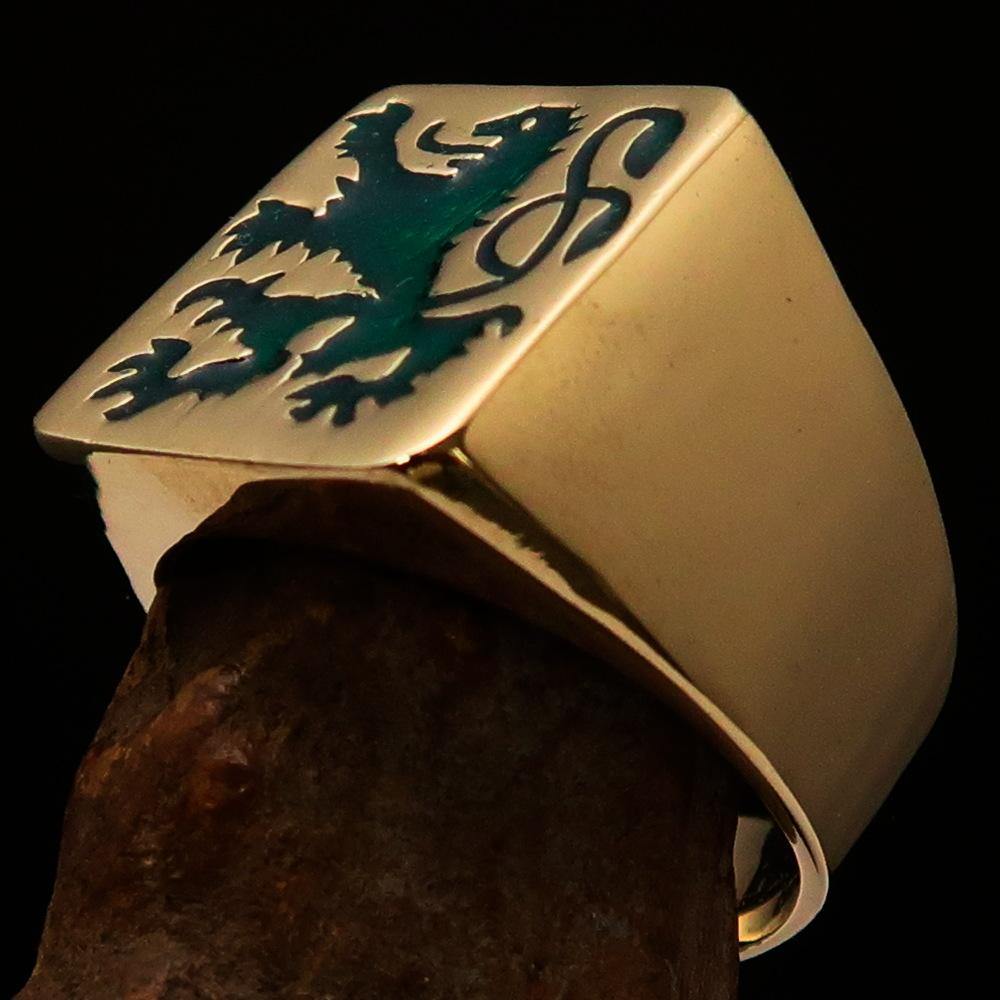 Men's Rampant Lion Ring made of solid brass with vibrant green enamel finish, featuring an intricate coat of arms design.