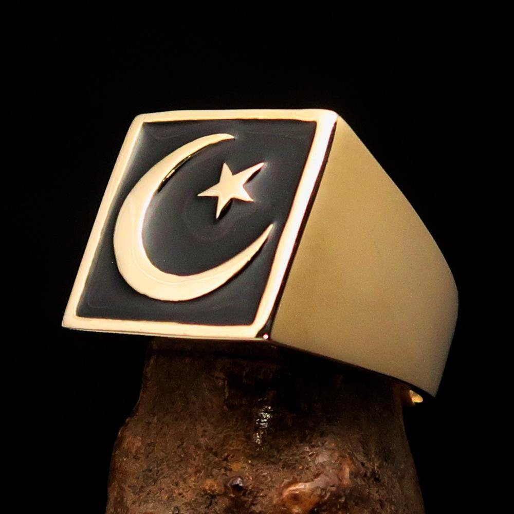 Men's ring featuring a crescent moon and star design, crafted from solid brass with a high-polished black enamel finish.