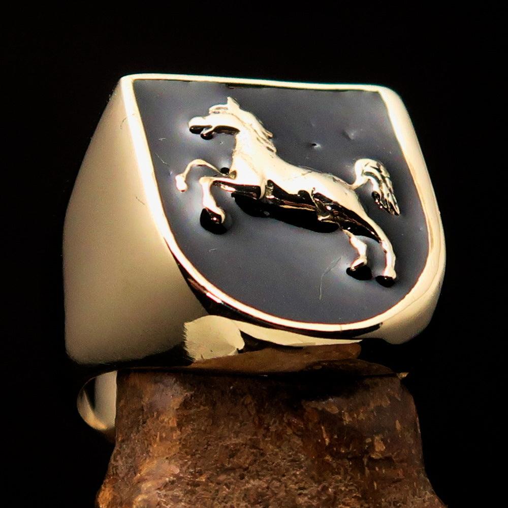 A beautifully crafted men's ring made of solid brass featuring a Horse Coat of Arms design, finished with black enamel for a sleek look.