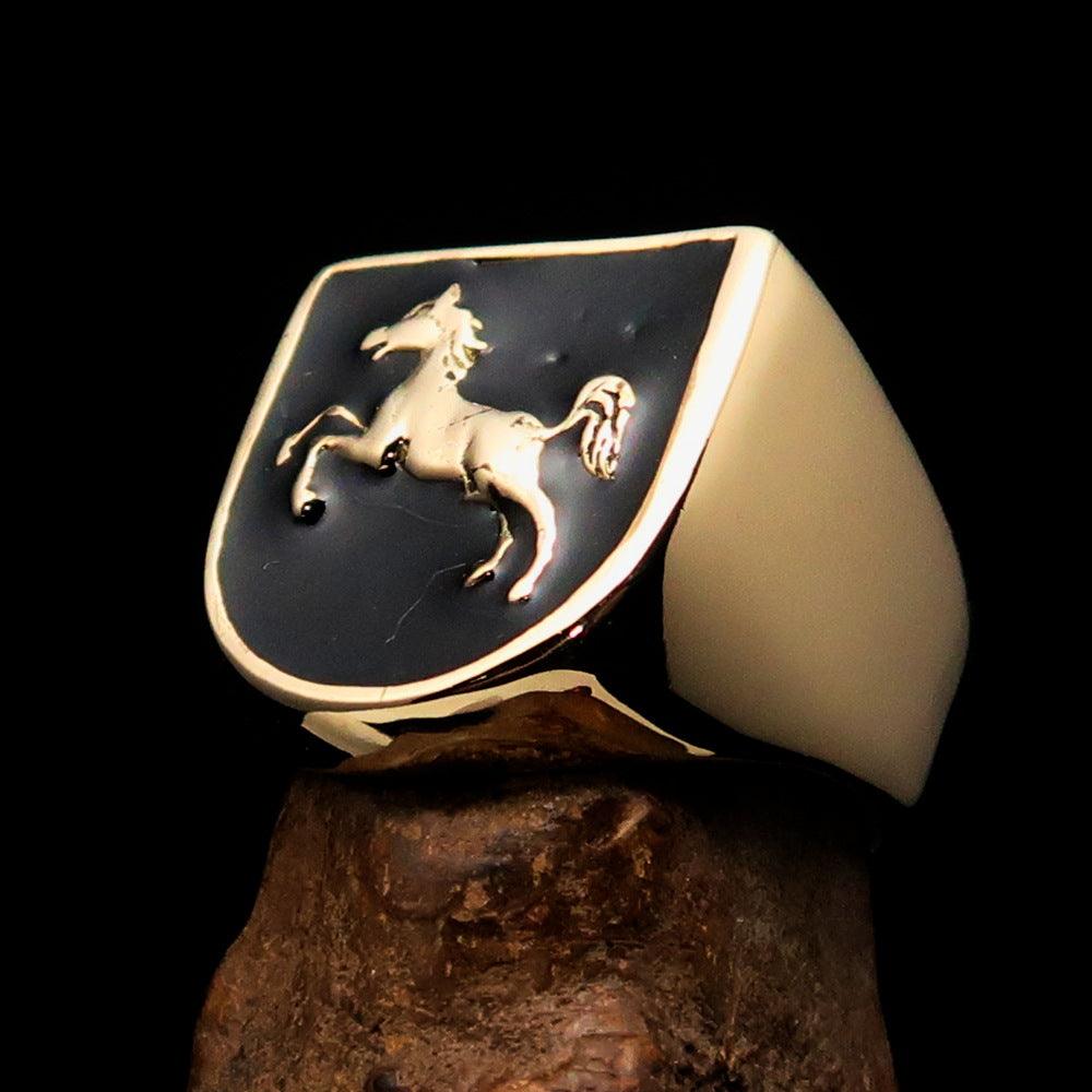 A beautifully crafted men's ring made of solid brass featuring a Horse Coat of Arms design, finished with black enamel for a sleek look.