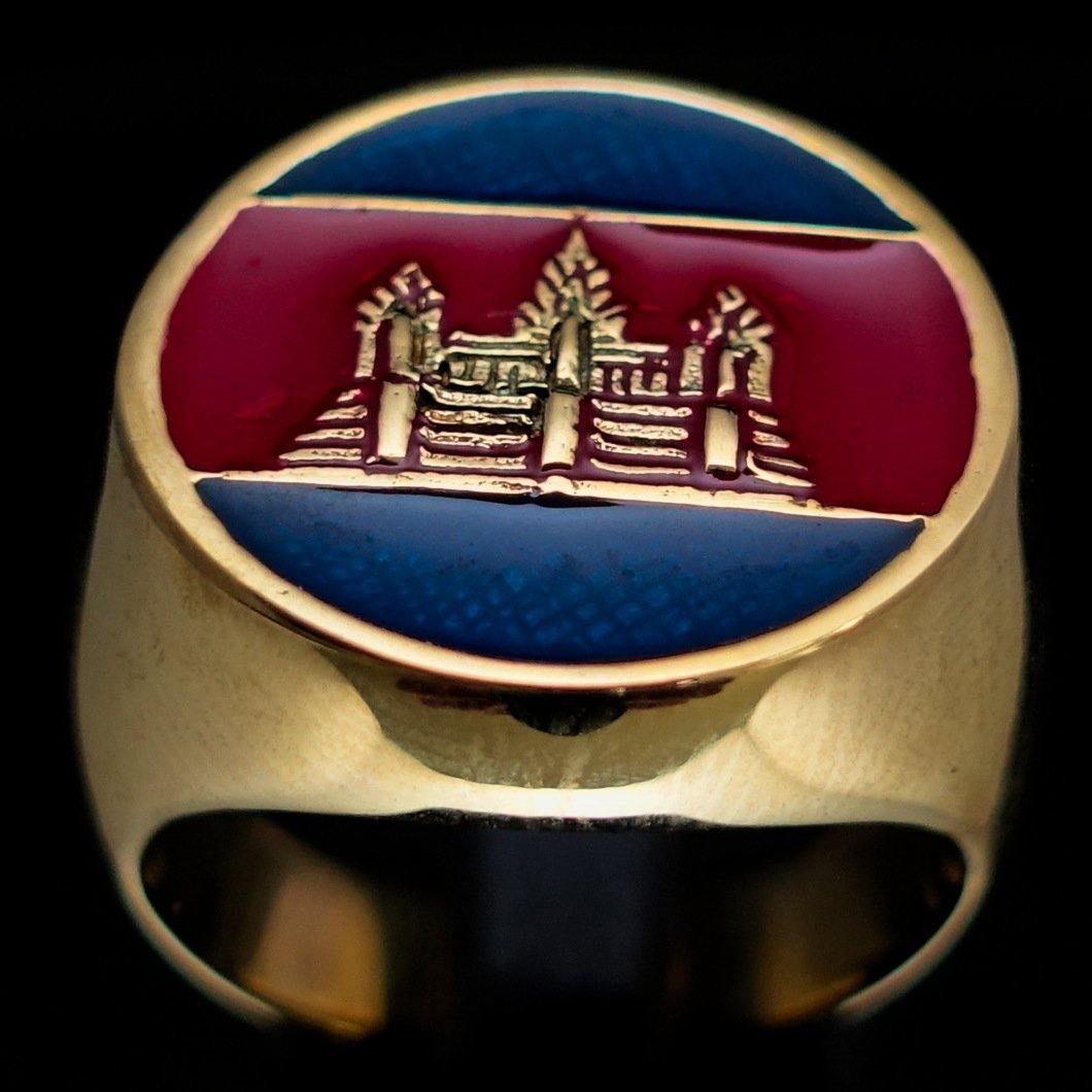 Men's round flag ring made of solid brass with blue and red enamel, showcasing a polished finish and unique design.