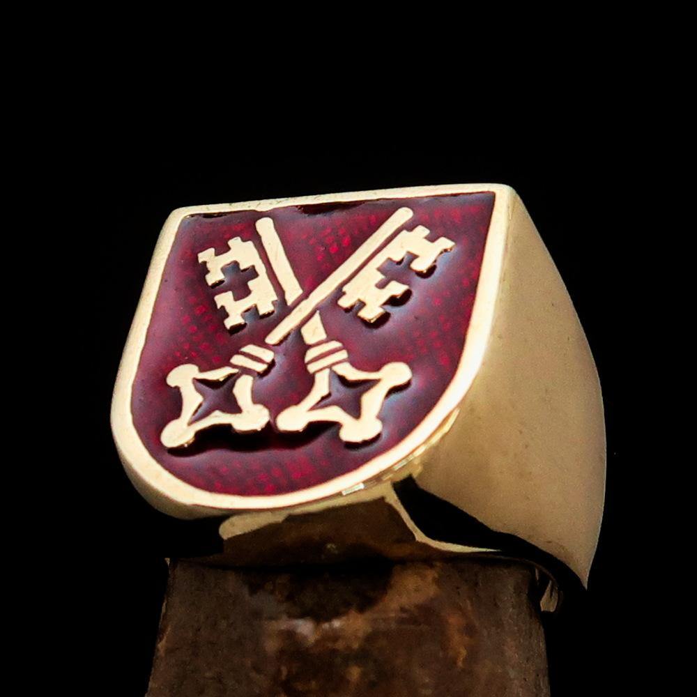 Men's Shield Ring featuring Crossed Skeleton Keys with a high polished finish and red enamel, showcasing medieval design.