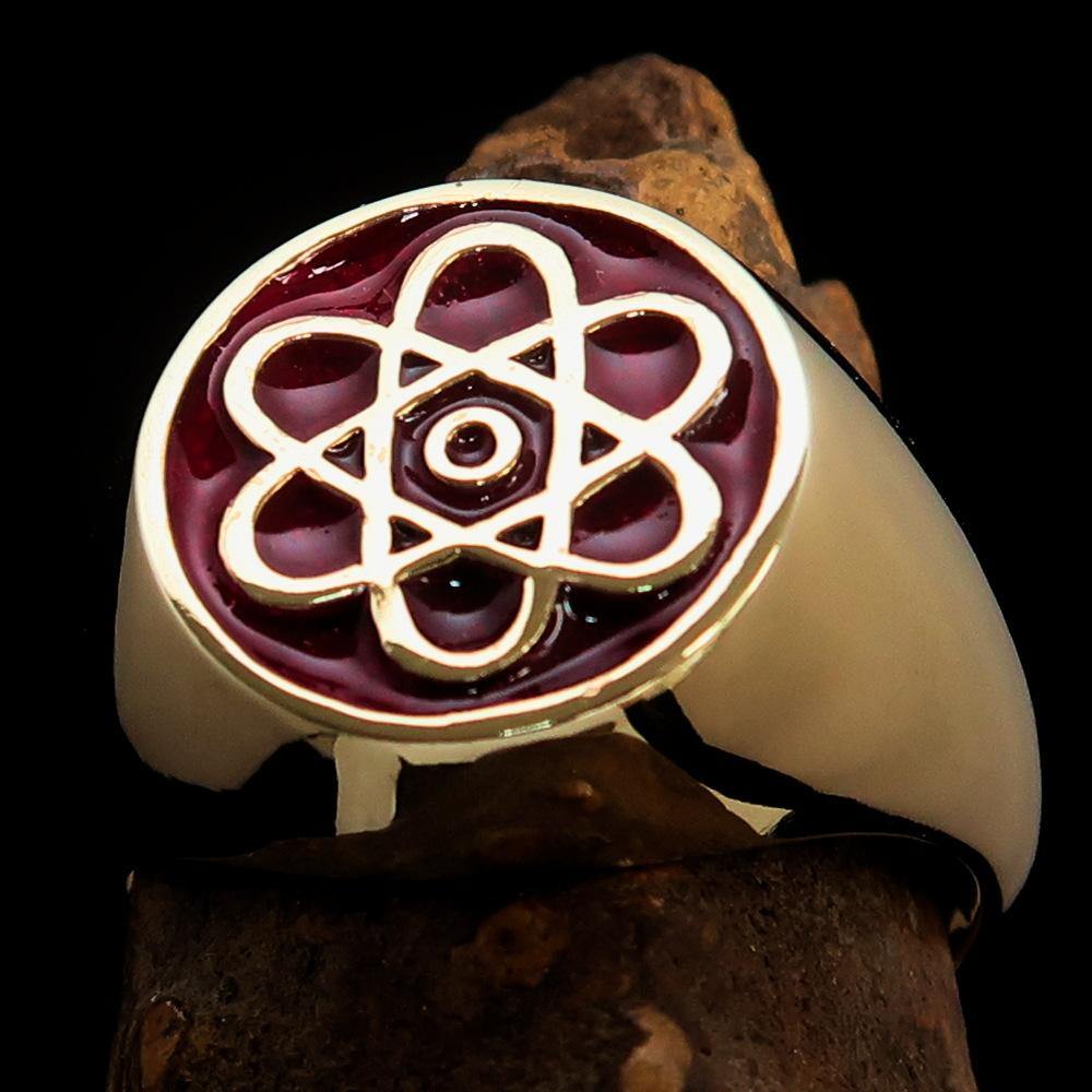 Men's Teacher Ring featuring Atom Symbol in solid brass with red enamel finish, showcasing its polished surface and unique design.