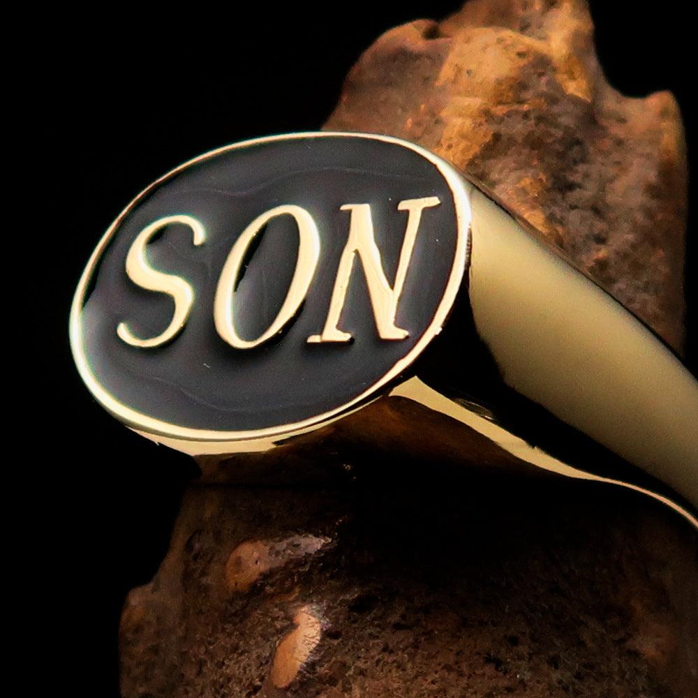 Perfectly crafted oval initial men's pinky ring in black SON enamel finish, showcasing a high polished solid brass design.