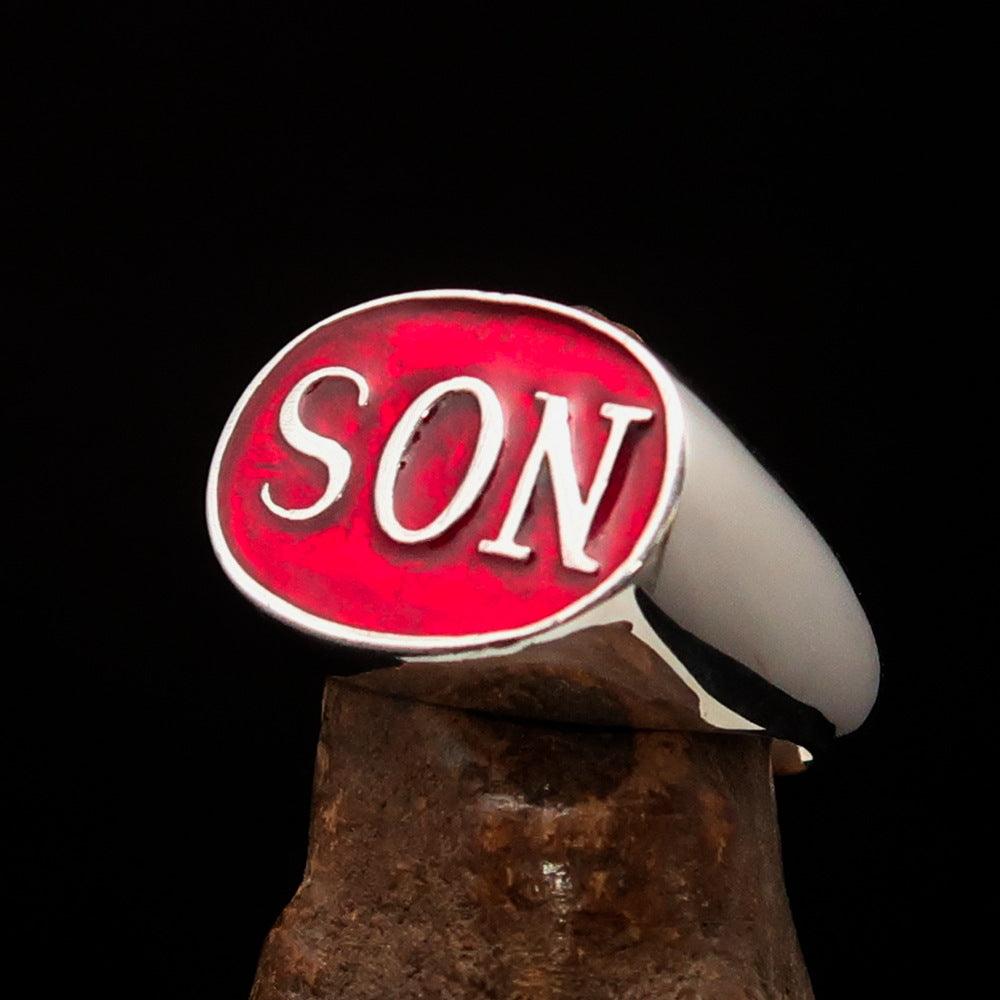 A beautifully crafted oval men's ring made of sterling silver with a red enamel initial 'SON', showcasing its high-polished finish.