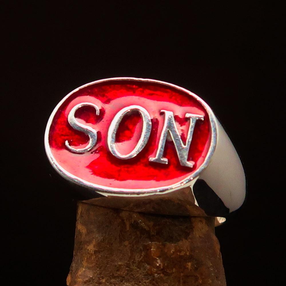 A beautifully crafted oval men's ring made of sterling silver with a red enamel initial 'SON', showcasing its high-polished finish.