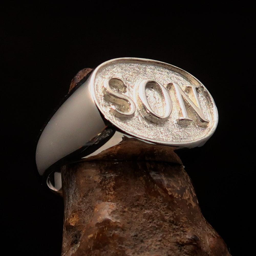 A two-tone oval initial men's ring made of solid sterling silver, featuring a high polished and matte finish with the initial 'SON'.