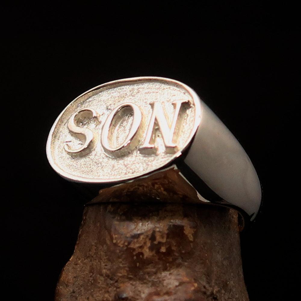 A two-tone oval initial men's ring made of solid sterling silver, featuring a high polished and matte finish with the initial 'SON'.