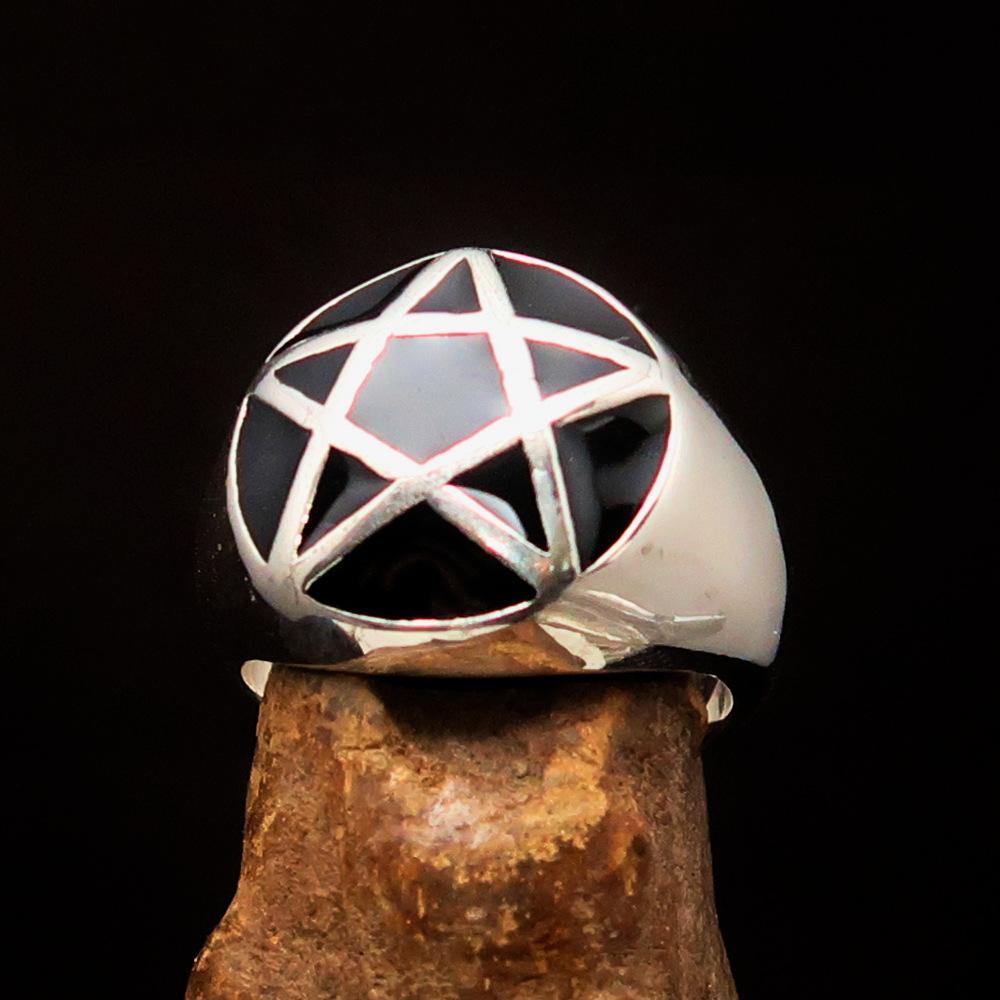 Perfectly domed Men's Solid Line Pentagram Ring in black enamel and sterling silver, showcasing its polished finish and pentagram design.