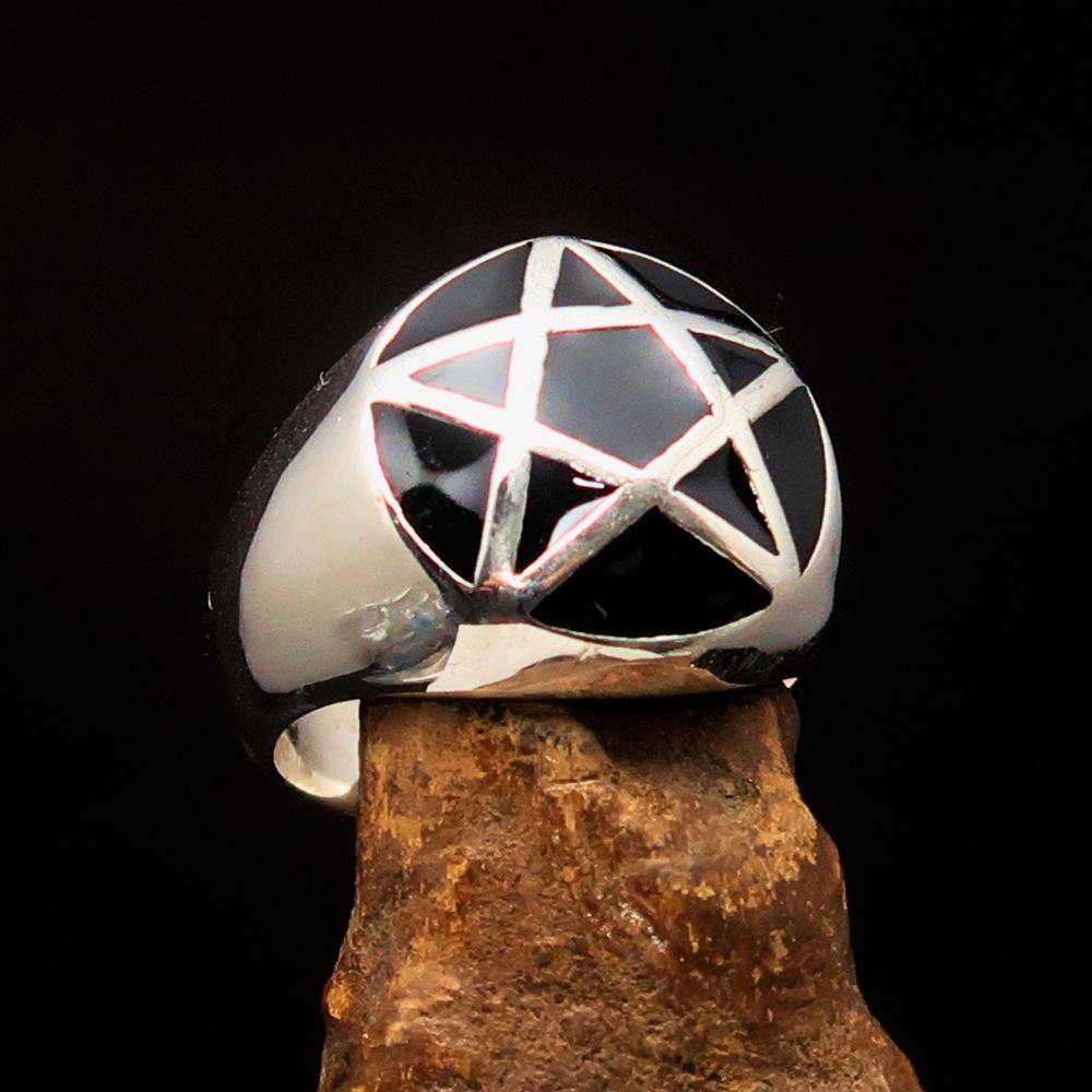 Perfectly domed Men's Solid Line Pentagram Ring in black enamel and sterling silver, showcasing its polished finish and pentagram design.