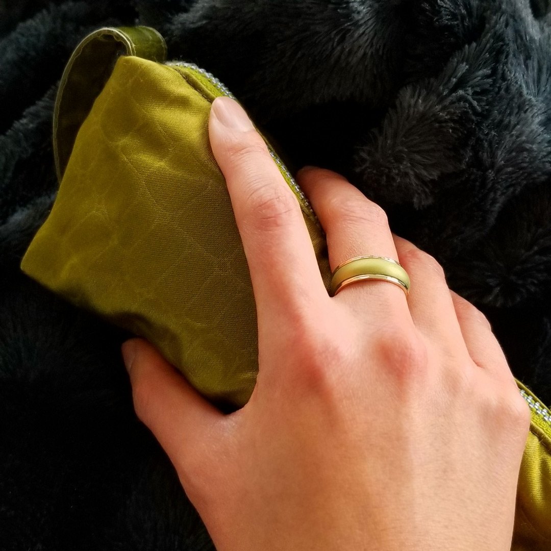 Peridot Green Breathable Silicone Ring for Women, showcasing its sleek bevel design and smooth surface.