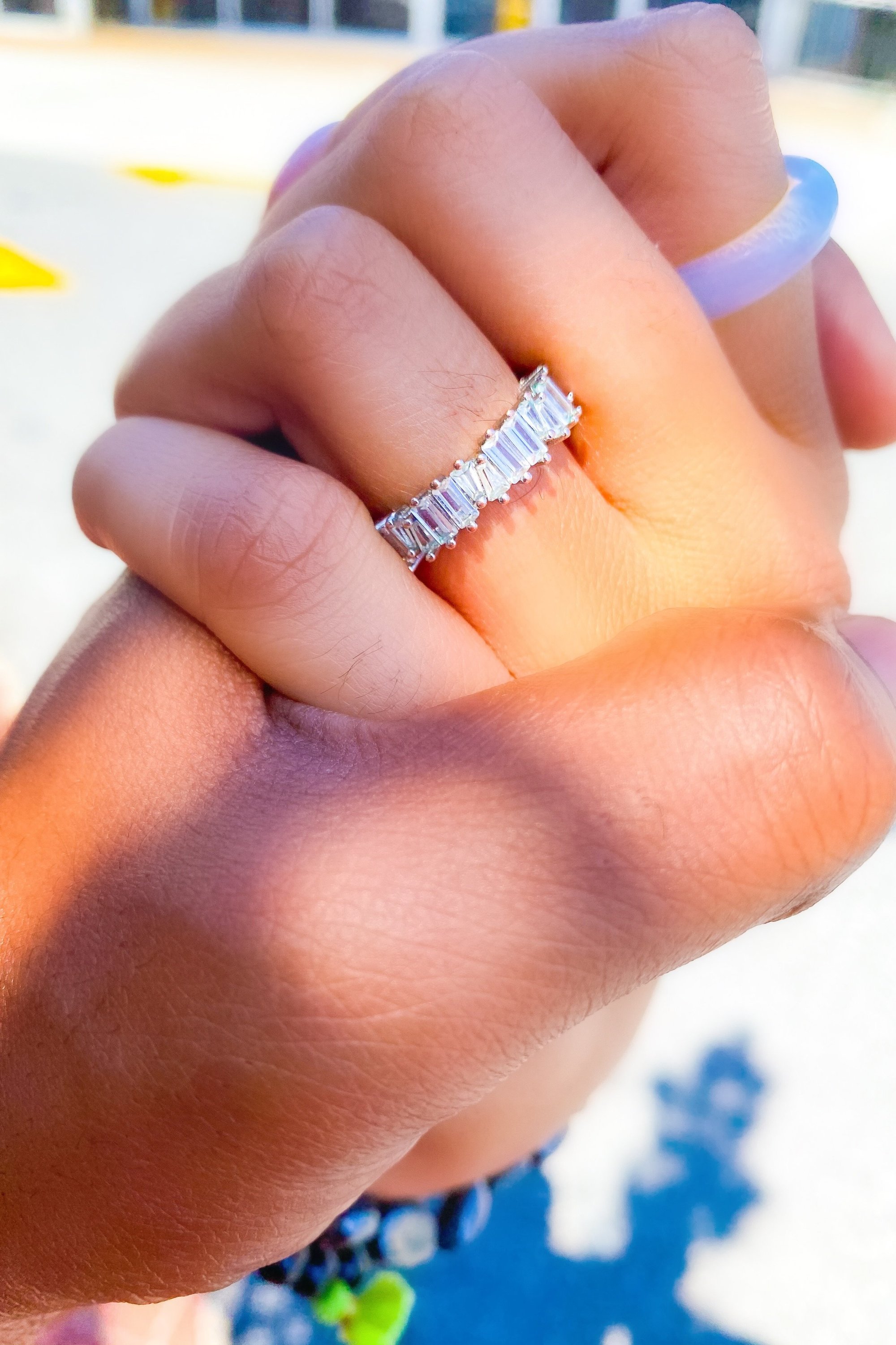 So Icy Diamond Baguette Ring in high polished white gold with flawless VVS simulants, showcasing its elegant design and sparkle.