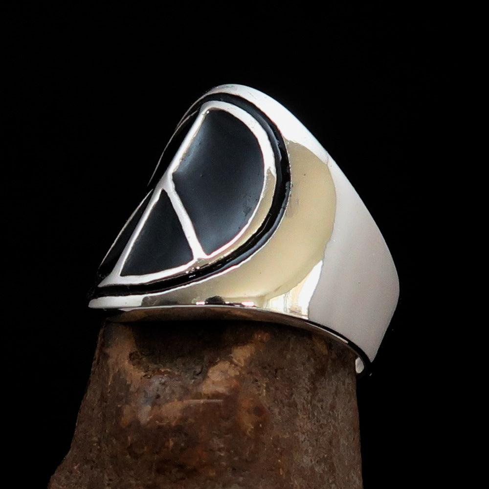 Round Men's Ring in Sterling Silver featuring a black Peace Symbol, showcasing high polish and elegant design.