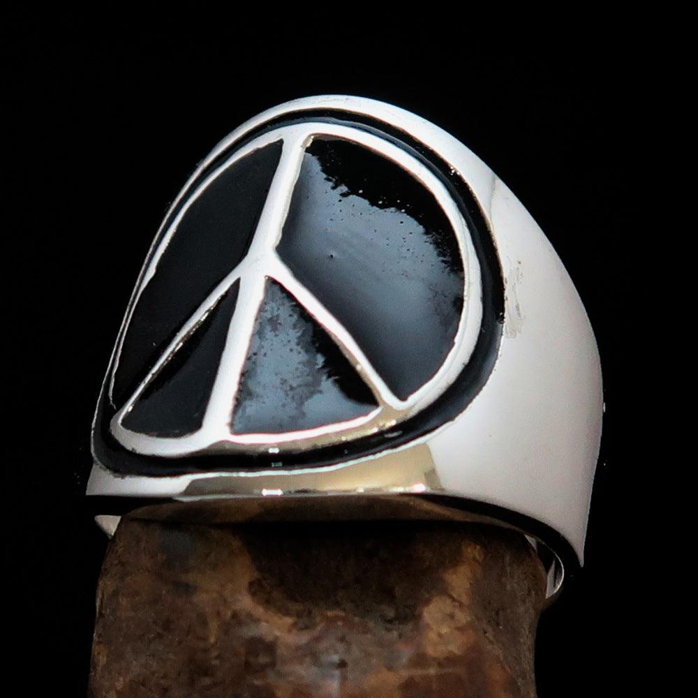 Round Men's Ring in Sterling Silver featuring a black Peace Symbol, showcasing high polish and elegant design.