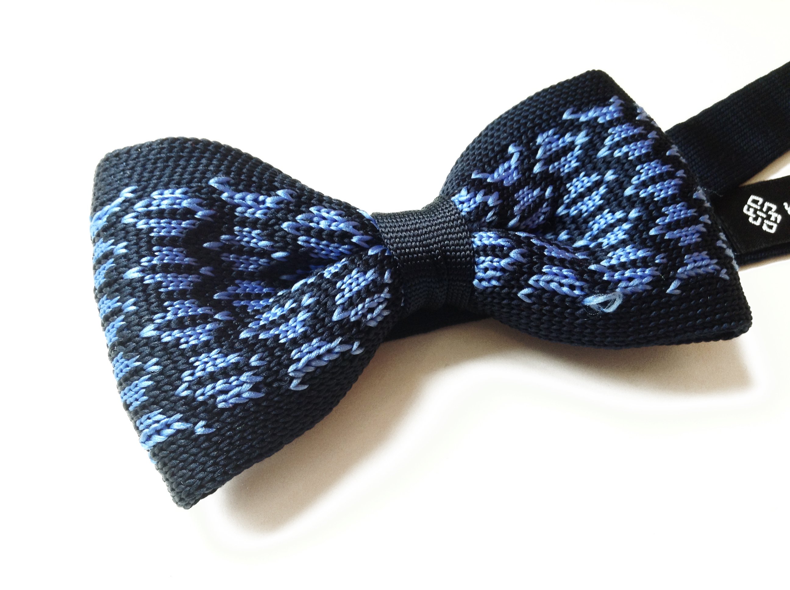 Smoke Rings Blue Knit Pre-tied Bow Tie showcasing a textured blue knit design, perfect for formal and casual occasions.