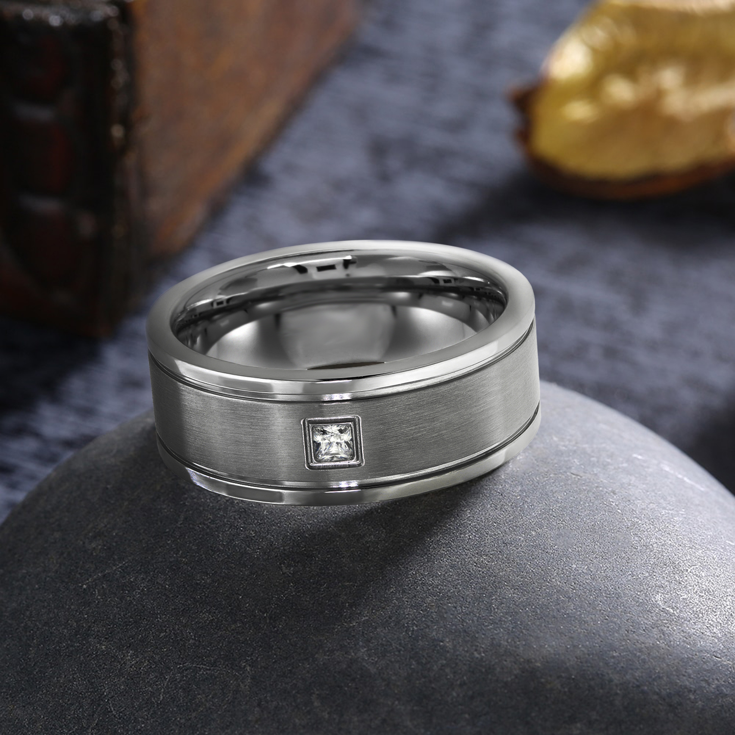 Stainless Steel 8mm Men's Square CZ Wedding Band featuring a cubic zirconia center, showcasing a contemporary design and comfort-fit inner band.