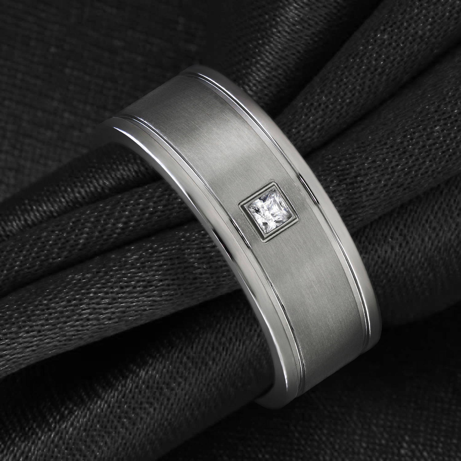 Stainless Steel 8mm Men's Square CZ Wedding Band featuring a cubic zirconia center, showcasing a contemporary design and comfort-fit inner band.