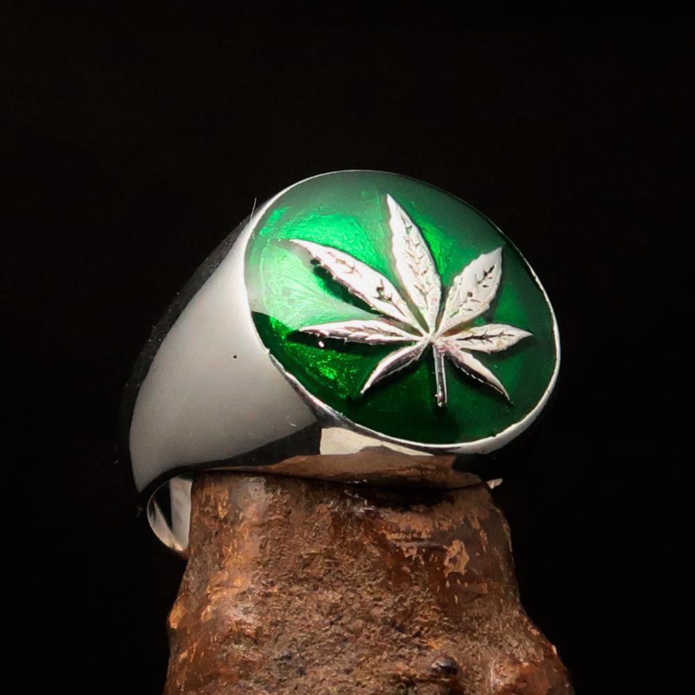 Sterling Silver Men's Ring with dark green Cannabis Leaf design, high polished finish, showcasing intricate details.