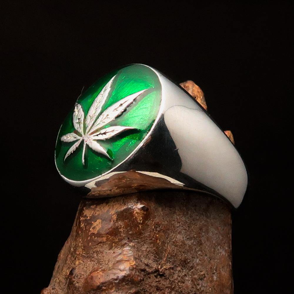 Sterling Silver Men's Ring with dark green Cannabis Leaf design, high polished finish, showcasing intricate details.