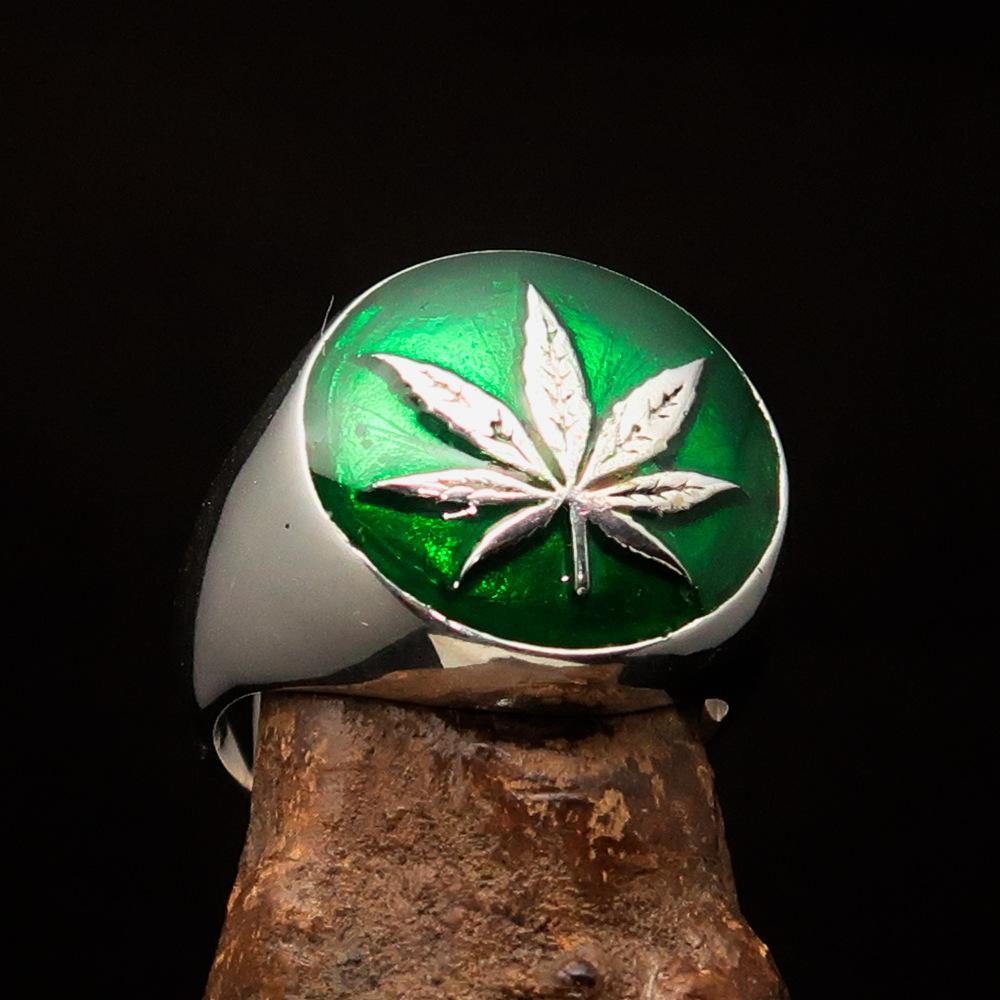 Sterling Silver Men's Ring with dark green Cannabis Leaf design, high polished finish, showcasing intricate details.