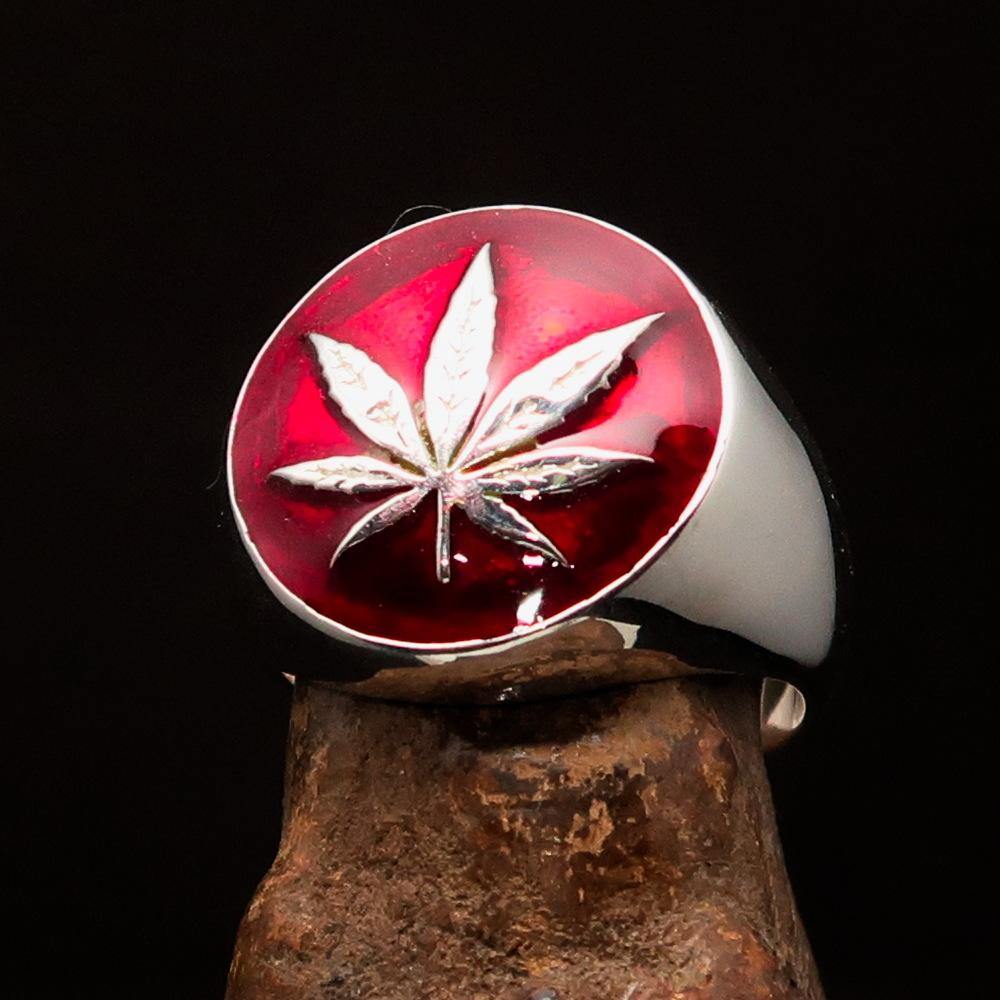 Sterling Silver Men's Ring featuring a Marihuana Cannabis Leaf design with red enamel accents, showcasing a polished finish.