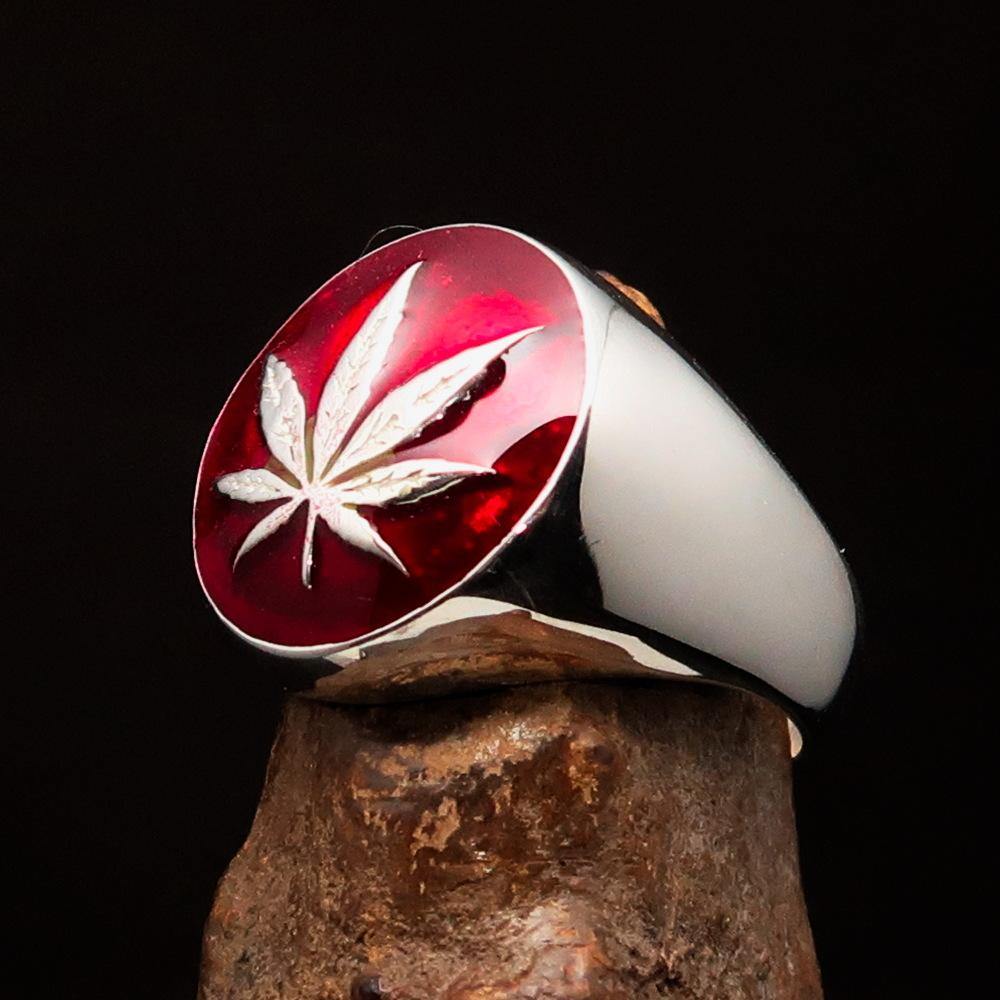 Sterling Silver Men's Ring featuring a Marihuana Cannabis Leaf design with red enamel accents, showcasing a polished finish.