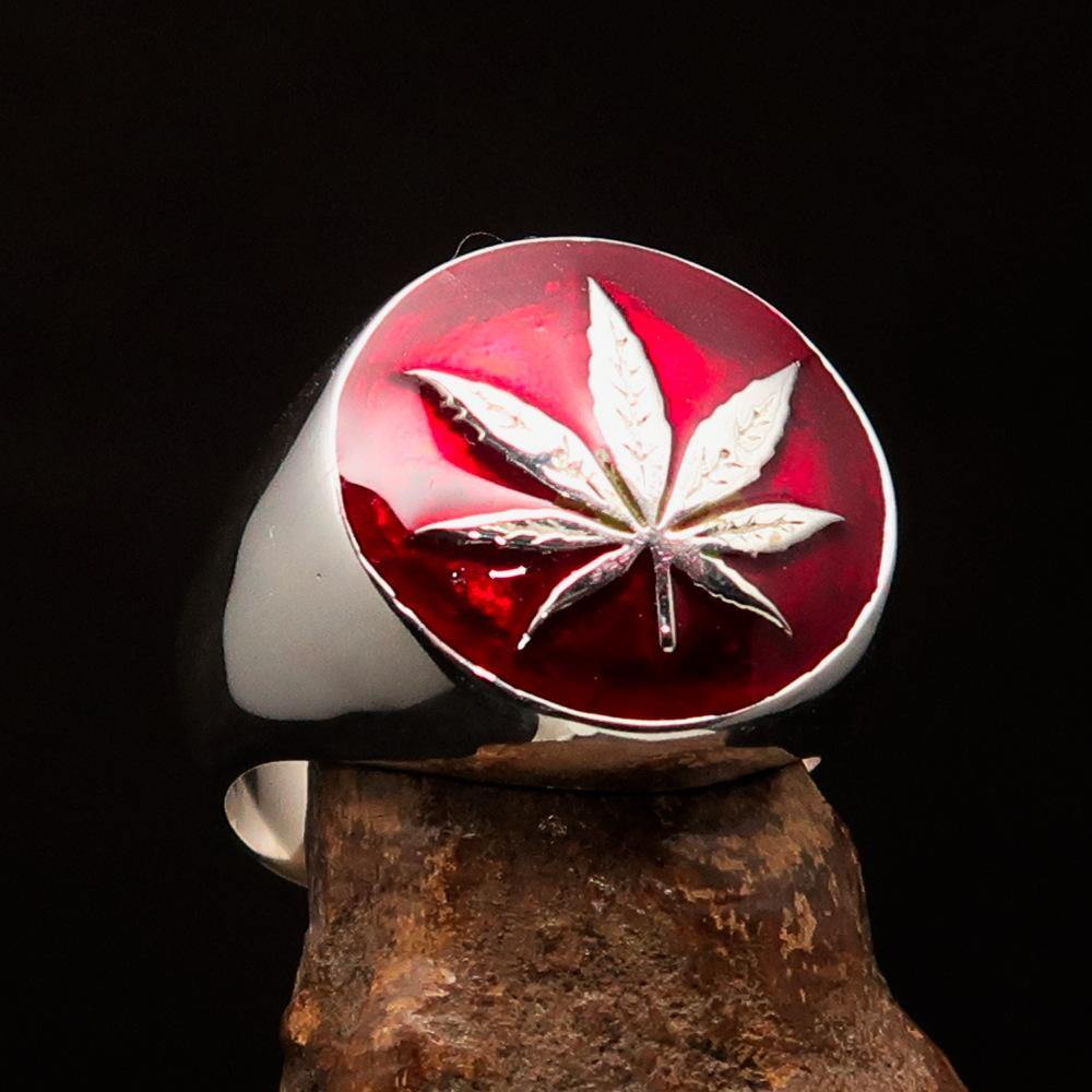 Sterling Silver Men's Ring featuring a Marihuana Cannabis Leaf design with red enamel accents, showcasing a polished finish.