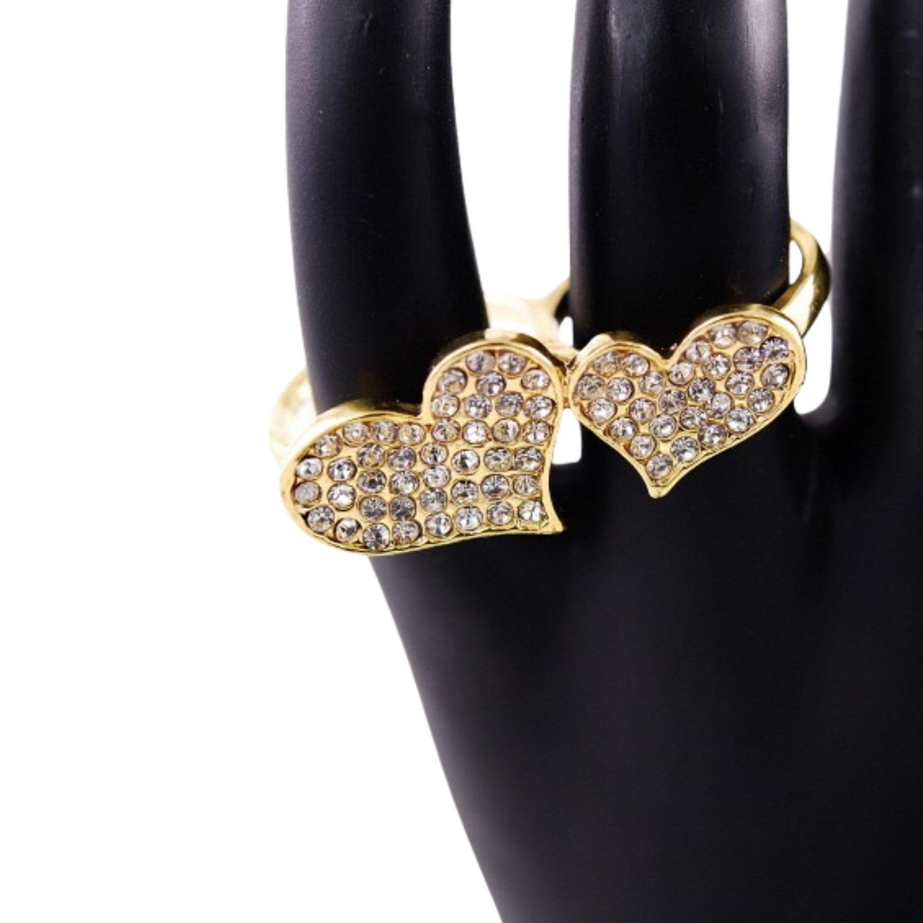 A pair of stylish studded heart two finger rings, showcasing a unique design with heart embellishments.