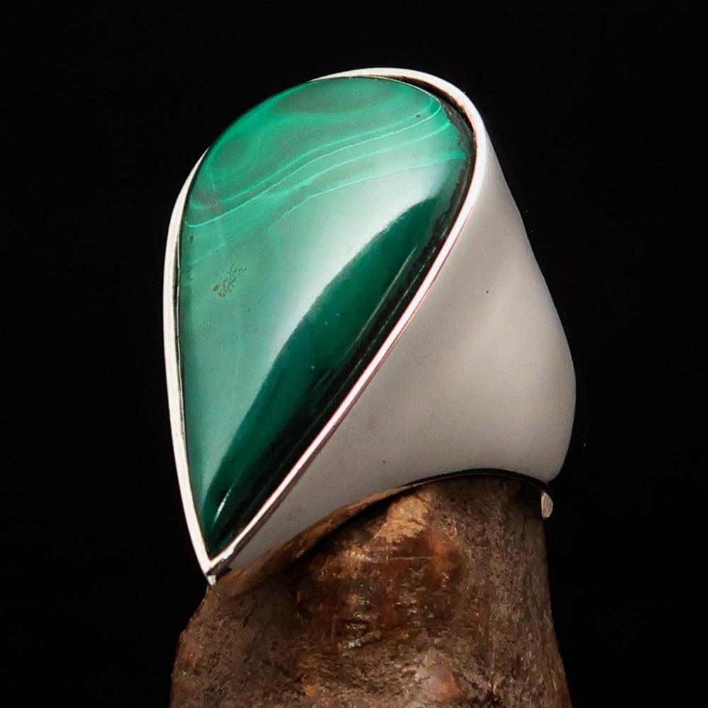 Tear shaped mirror polished sterling silver ring featuring a pear shaped green malachite stone, showcasing its elegant design and craftsmanship.