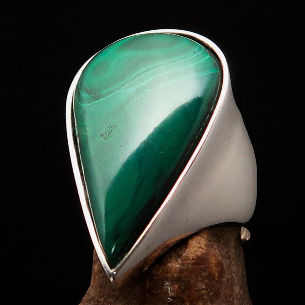 Tear shaped mirror polished sterling silver ring featuring a pear shaped green malachite stone, showcasing its elegant design and craftsmanship.