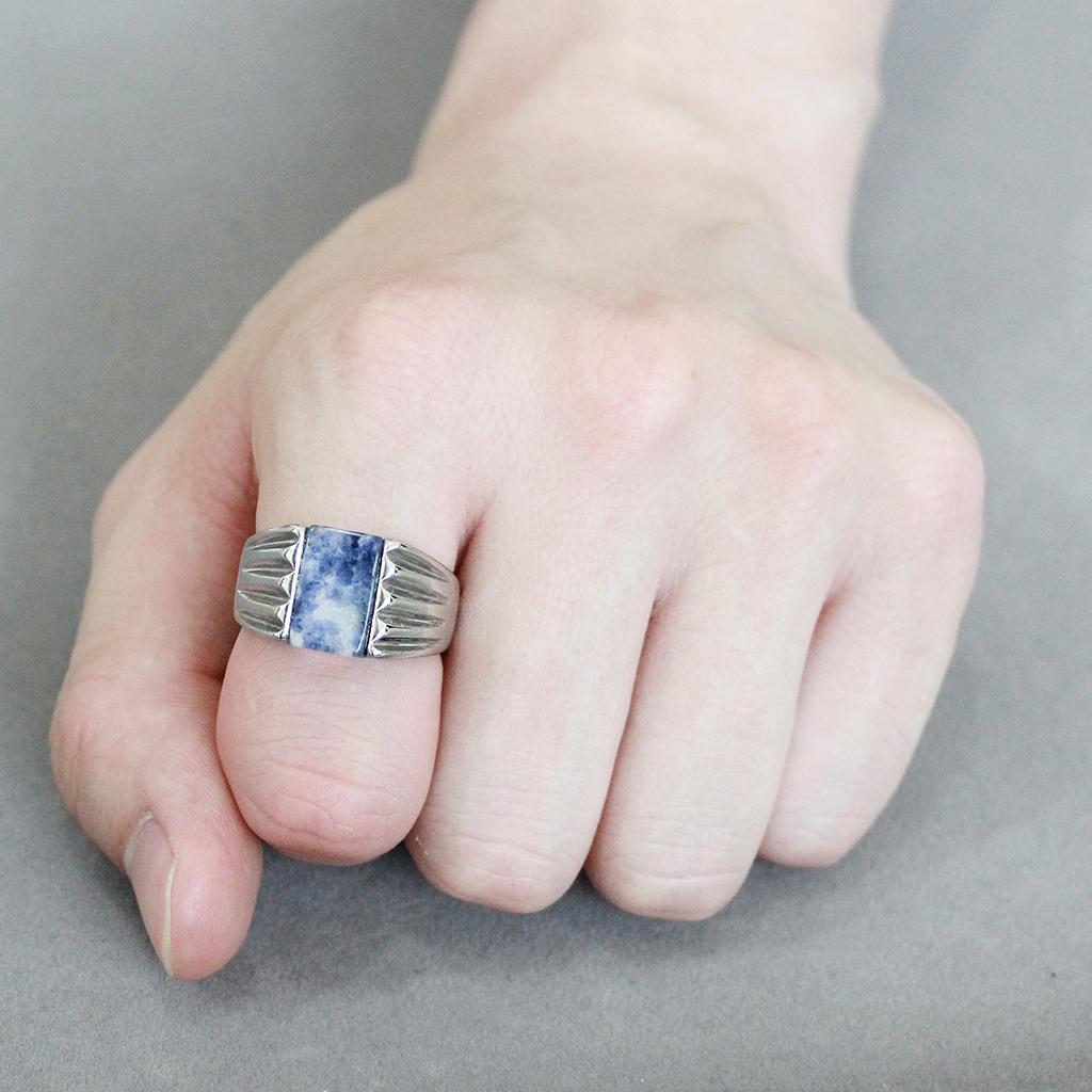 TK1799 High Polished Stainless Steel Ring featuring a Capri Blue Sodalite stone, showcasing its elegant design and shiny finish.