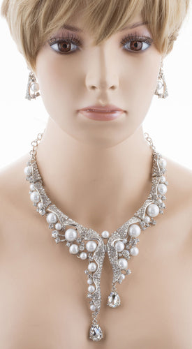 Bridal Wedding Jewelry Set featuring Crystal Pearl Chunky Duo Linear Drops, showcasing a silver necklace with rhinestones and faux pearls, and matching earrings.