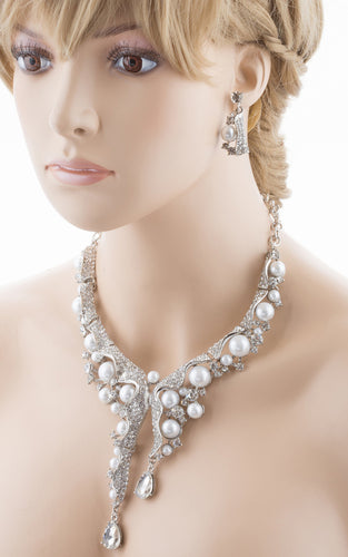 Bridal Wedding Jewelry Set featuring Crystal Pearl Chunky Duo Linear Drops, showcasing a silver necklace with rhinestones and faux pearls, and matching earrings.