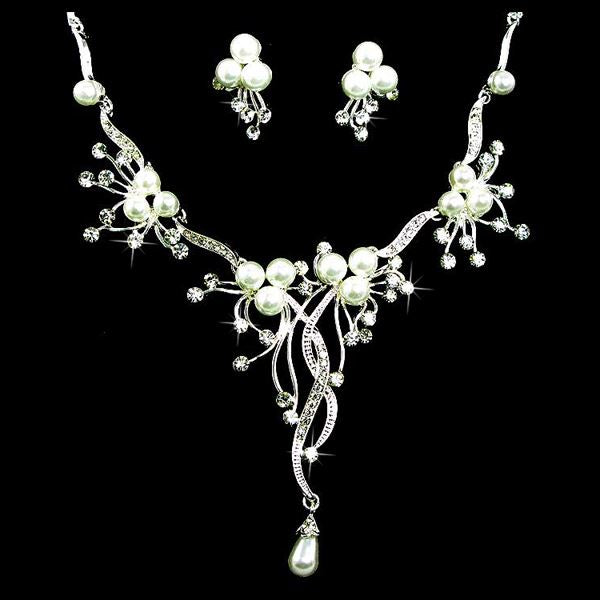 Bridal Wedding Jewelry Set featuring crystal rhinestones and faux pearls in a floral vine design, including a necklace and matching earrings.