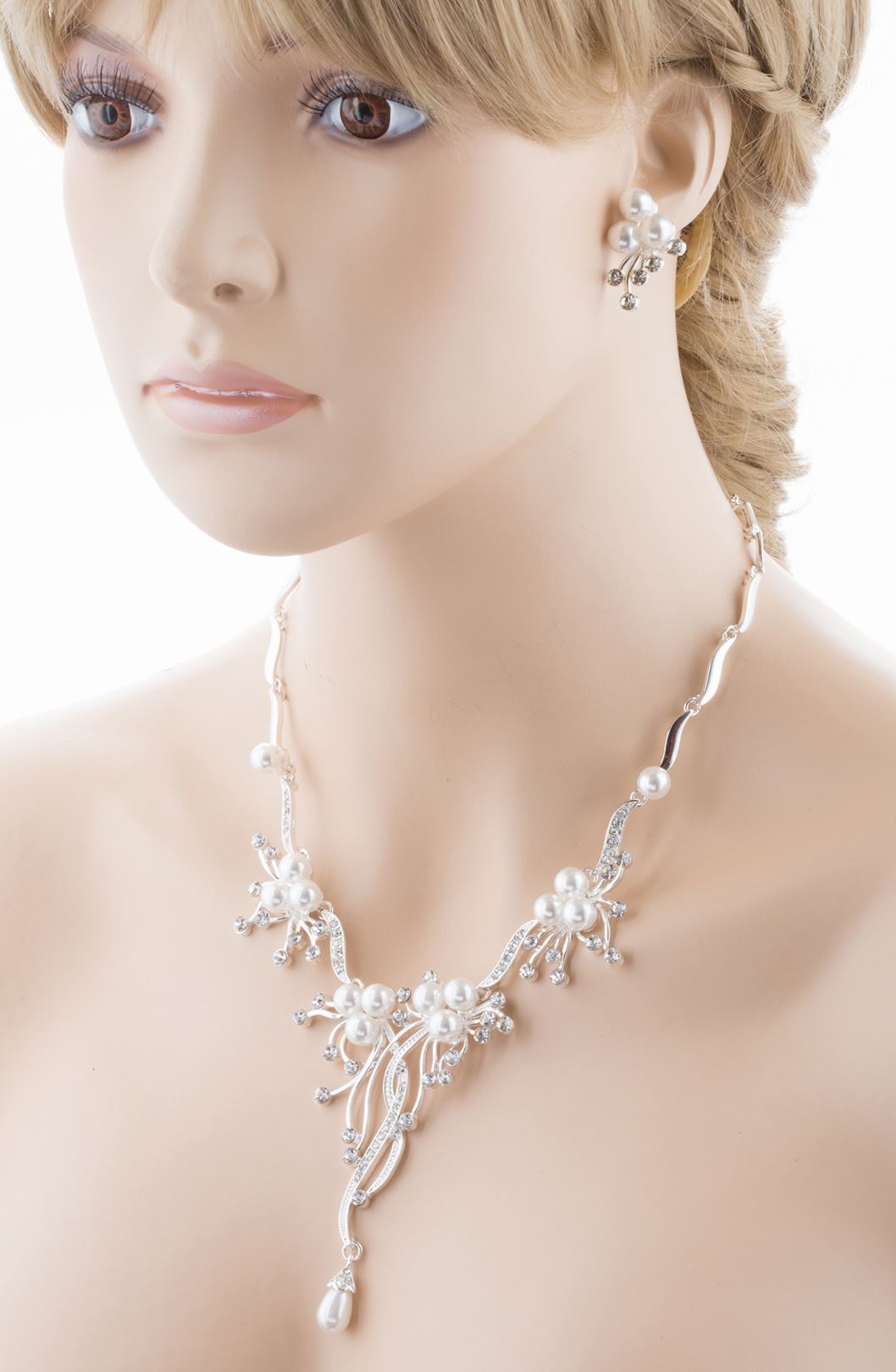 Bridal Wedding Jewelry Set featuring crystal rhinestones and faux pearls in a floral vine design, including a necklace and matching earrings.