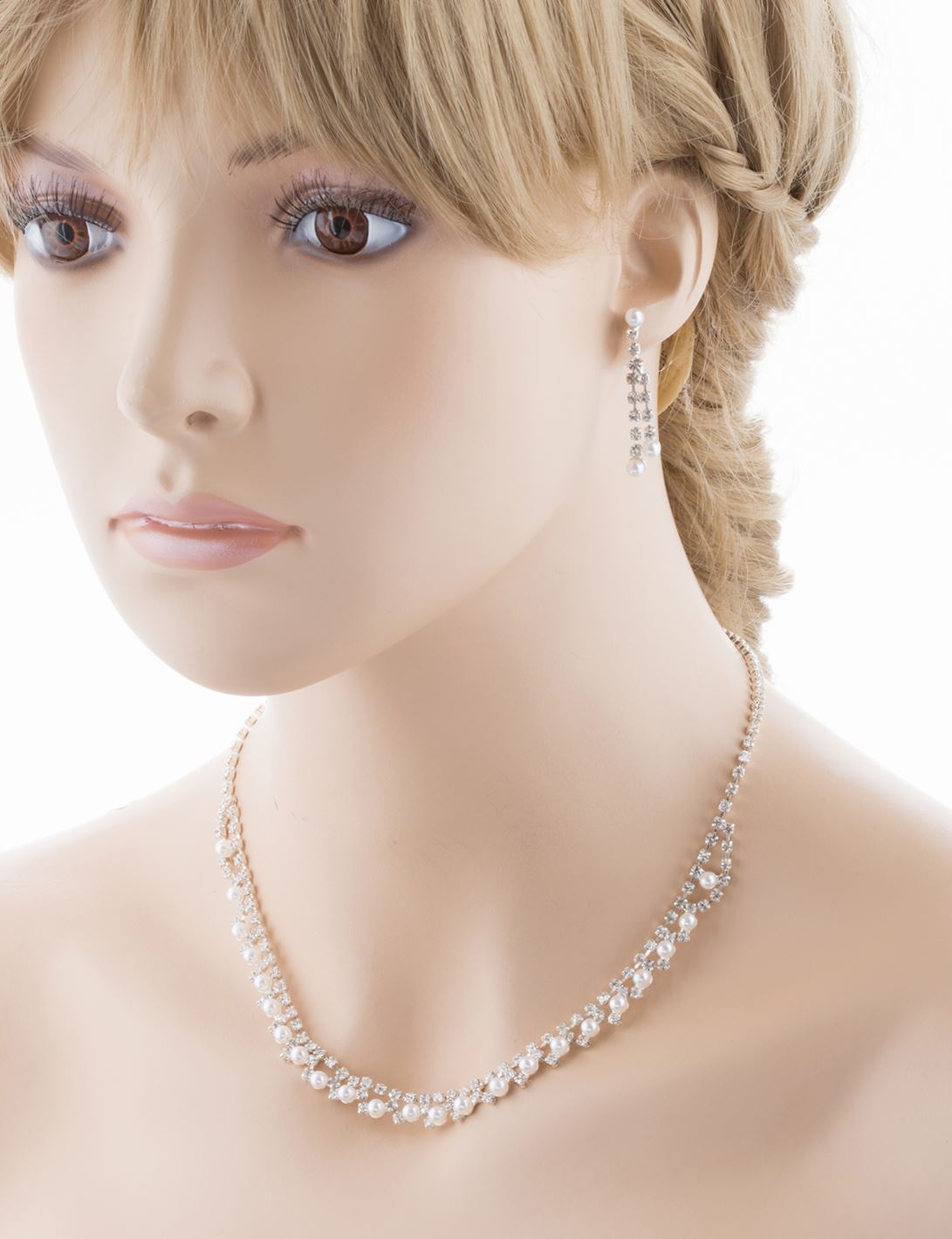 Bridal Wedding Jewelry Set featuring crystal rhinestones and faux pearls, including a necklace and matching earrings in silver plating.