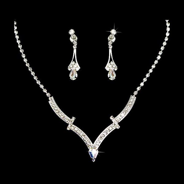 Bridal Wedding Jewelry Set featuring a silver necklace with clear crystal rhinestones and matching drop earrings, elegantly displayed.