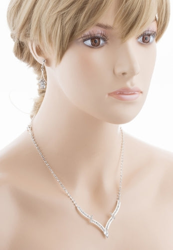 Bridal Wedding Jewelry Set featuring a silver necklace with clear crystal rhinestones and matching drop earrings, elegantly displayed.