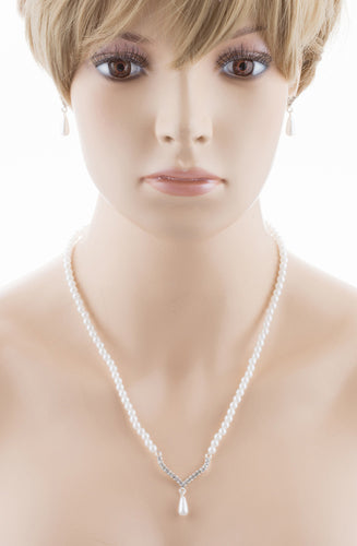 Bridal Wedding Jewelry Set featuring crystal rhinestones and teardrop pearls, elegantly displayed with a silver finish.