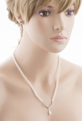 Bridal Wedding Jewelry Set featuring crystal rhinestones and teardrop pearls, elegantly displayed with a silver finish.