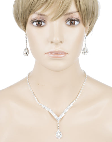 Bridal Wedding Jewelry Set featuring a silver necklace and matching earrings adorned with clear crystal rhinestones in a V-drop design.