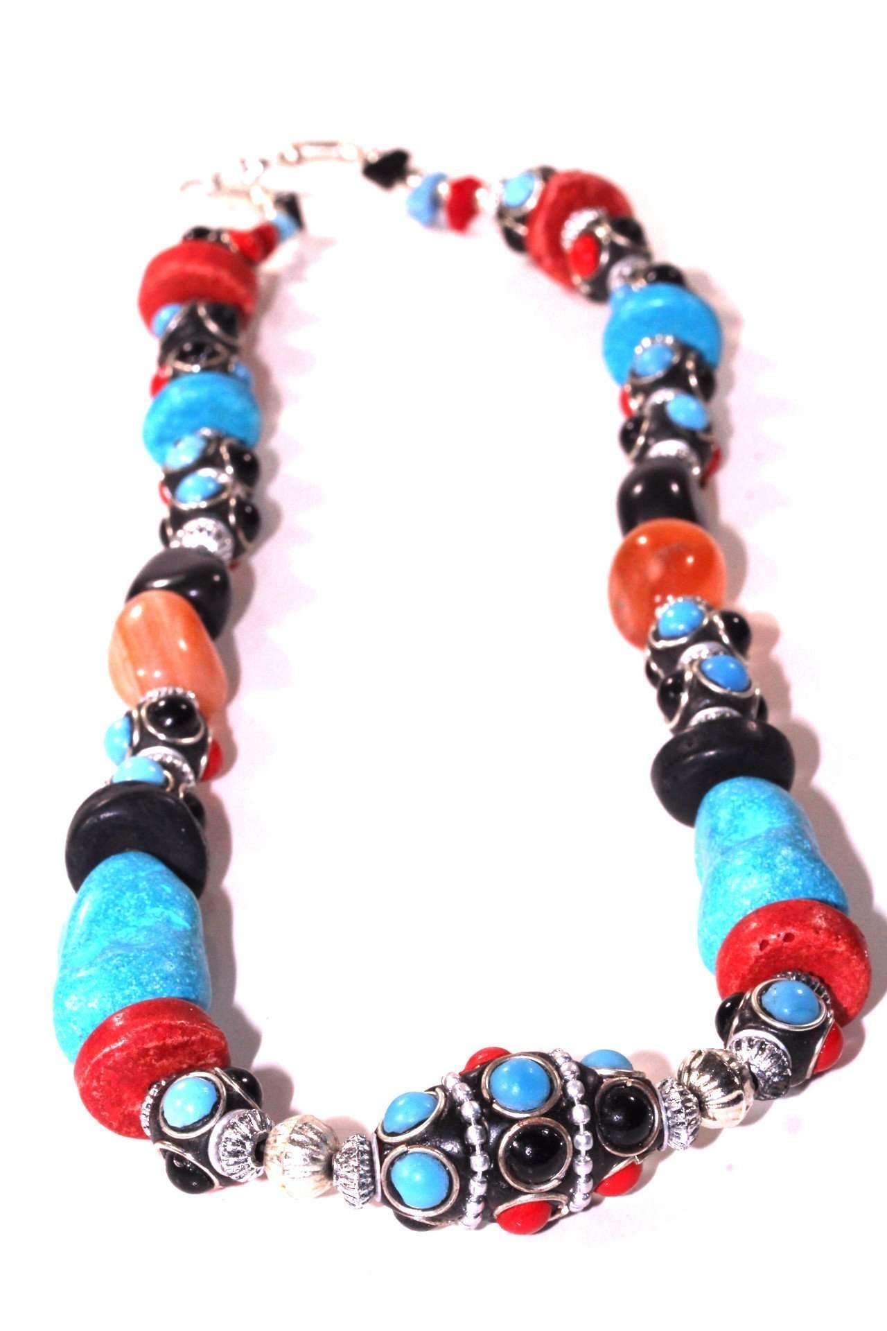 Eastern Flare Resin Beads & Charms Necklace featuring vibrant turquoise and coral red beads, shiny silver tone charms, and matching earrings.