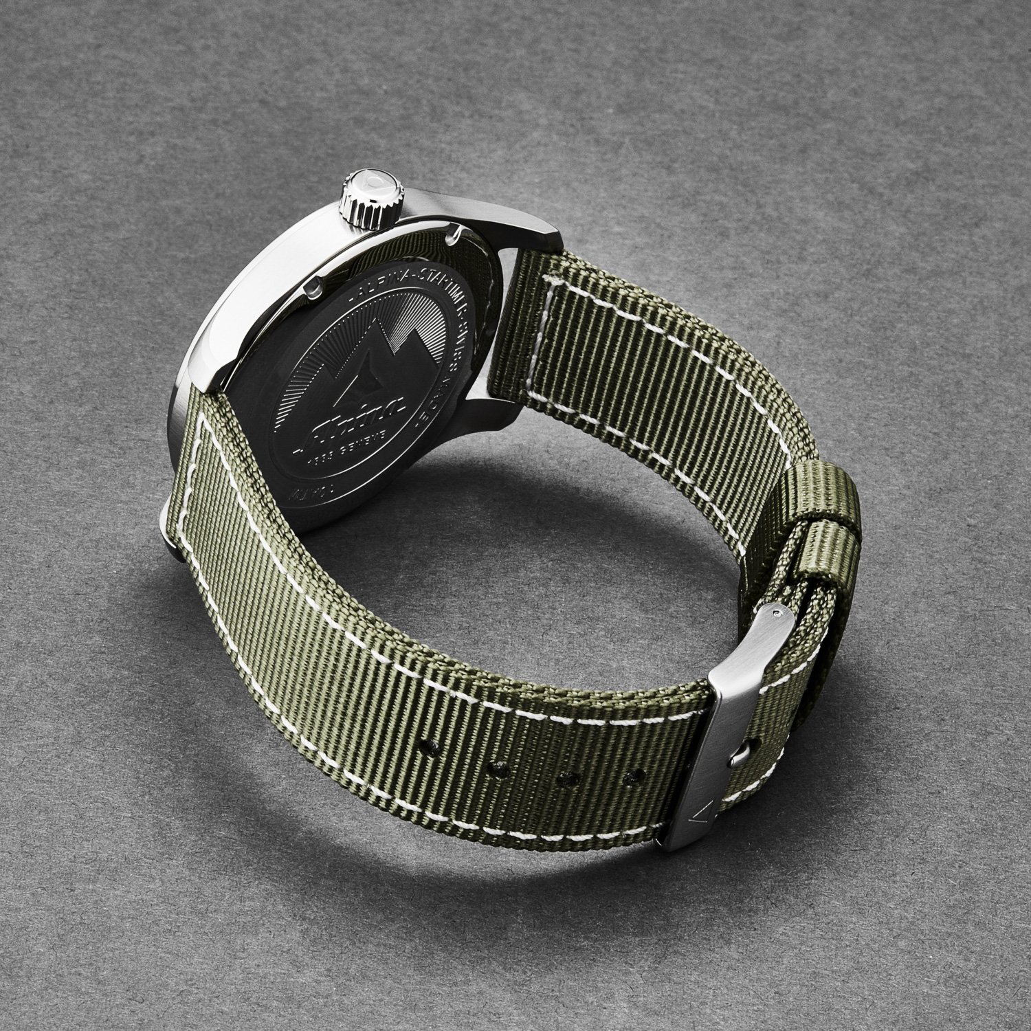 Alpina AL240S4S6 Men's 'Startimer Pilot' watch featuring a white dial and green nylon strap, showcasing its elegant design and durable materials.