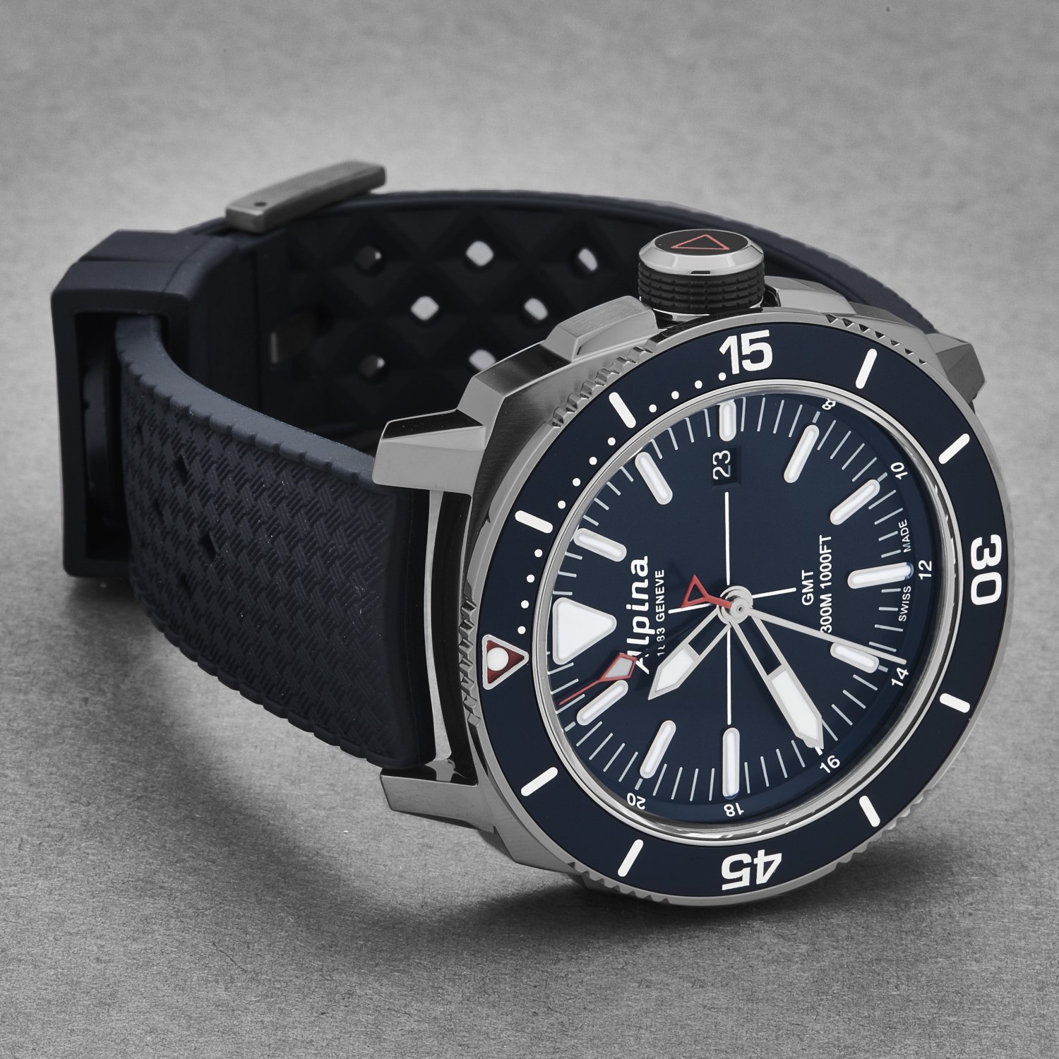 Alpina AL247LNN4TV6 Men's 'Seastrong Diver' GMT watch featuring a blue dial and blue rubber band, ideal for water sports.