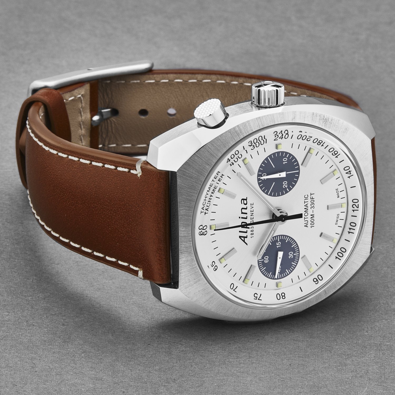 Alpina Men's AL727SS4H6 Startimer Pilot watch featuring a silver dial and brown leather band, showcasing its elegant design and automatic movement.