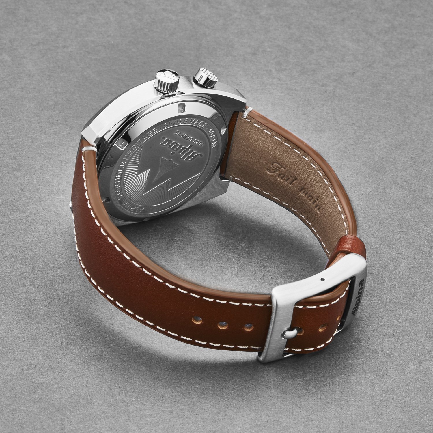 Alpina Men's AL727SS4H6 Startimer Pilot watch featuring a silver dial and brown leather band, showcasing its elegant design and automatic movement.