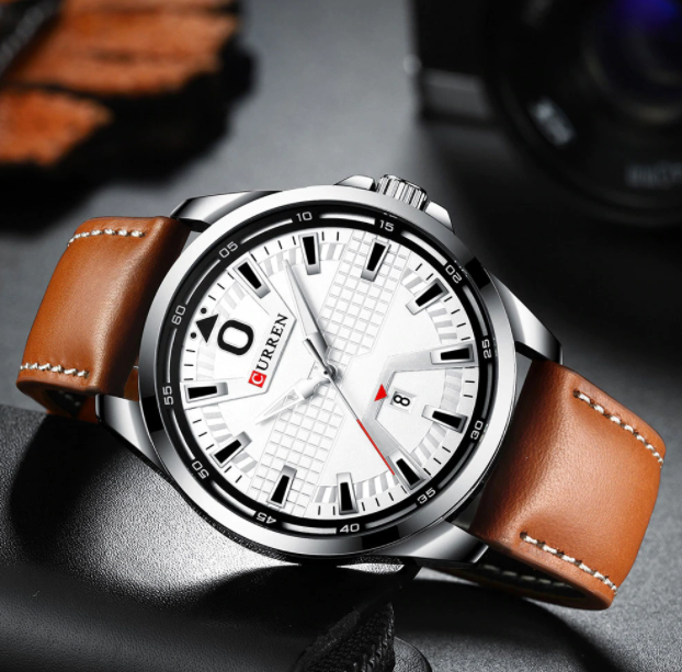 Archetypal Curren Leather Watch featuring a black dial, ivory hour markers, and a brown genuine leather wristband.