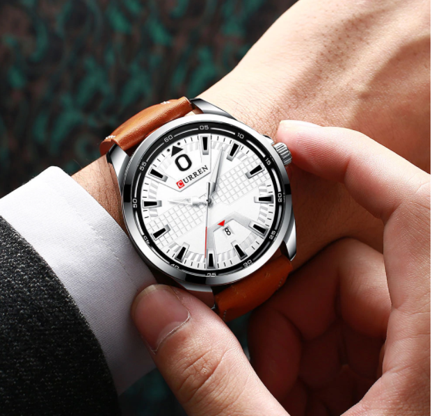 Archetypal Curren Leather Watch featuring a black dial, ivory hour markers, and a brown genuine leather wristband.