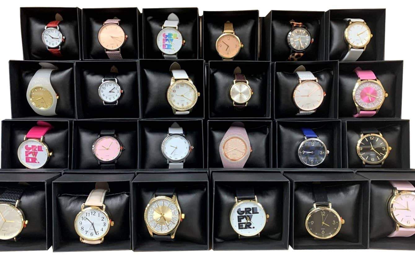 A collection of 24 assorted women's watches displayed in an elegant gift box, showcasing various styles and colors.